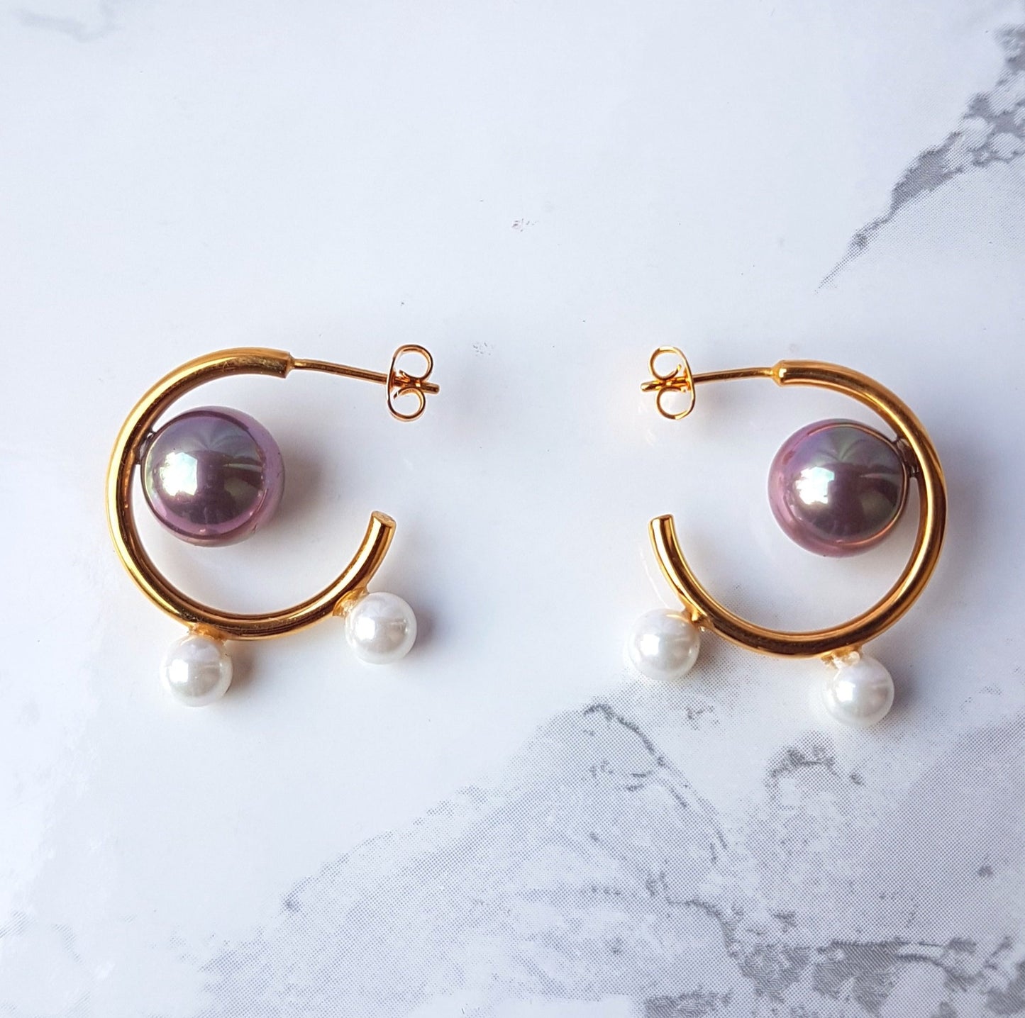 The Pearl Mini Hoop earrings in Gold