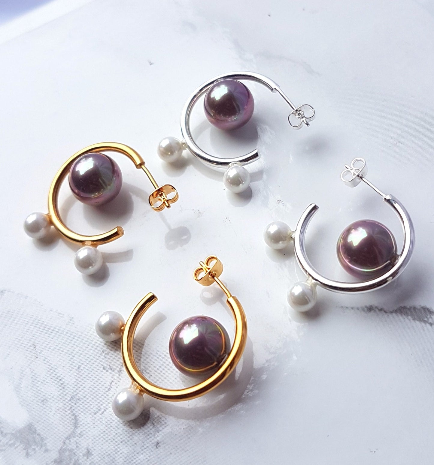 The Pearl Mini Hoop earrings in Gold