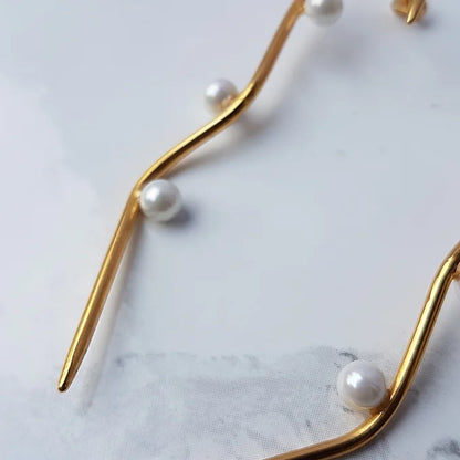Stem Pearl earrings- Gold